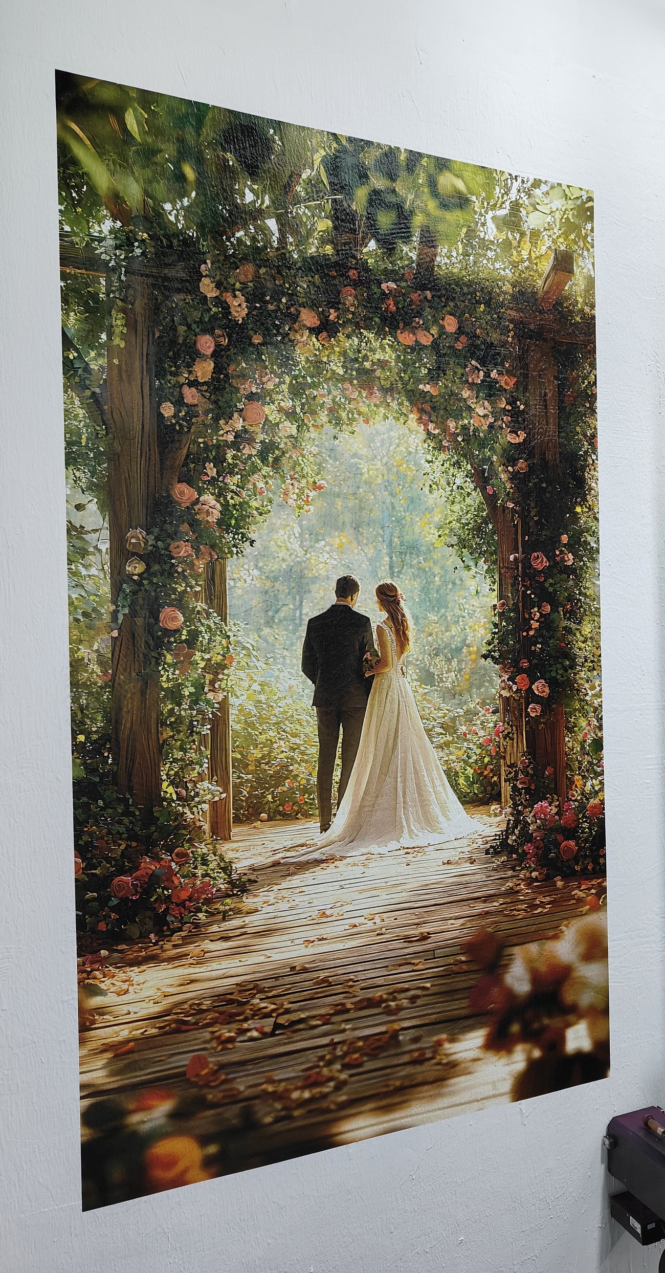 Floral archway mural with a couple, printed floor to ceiling on an interior wall